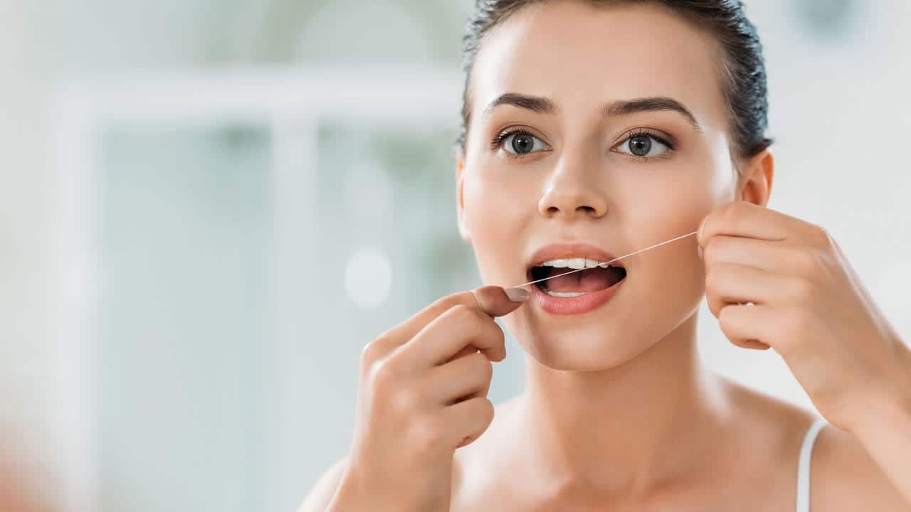 The Link Between Poor Flossing and Gum Disease Reigate